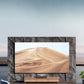 Formovie Theater Premium & celexon BrightOnyx UST-Bundle – Formovie Theater Premium auf dem Lowboard unter einer großen Projektionsfläche